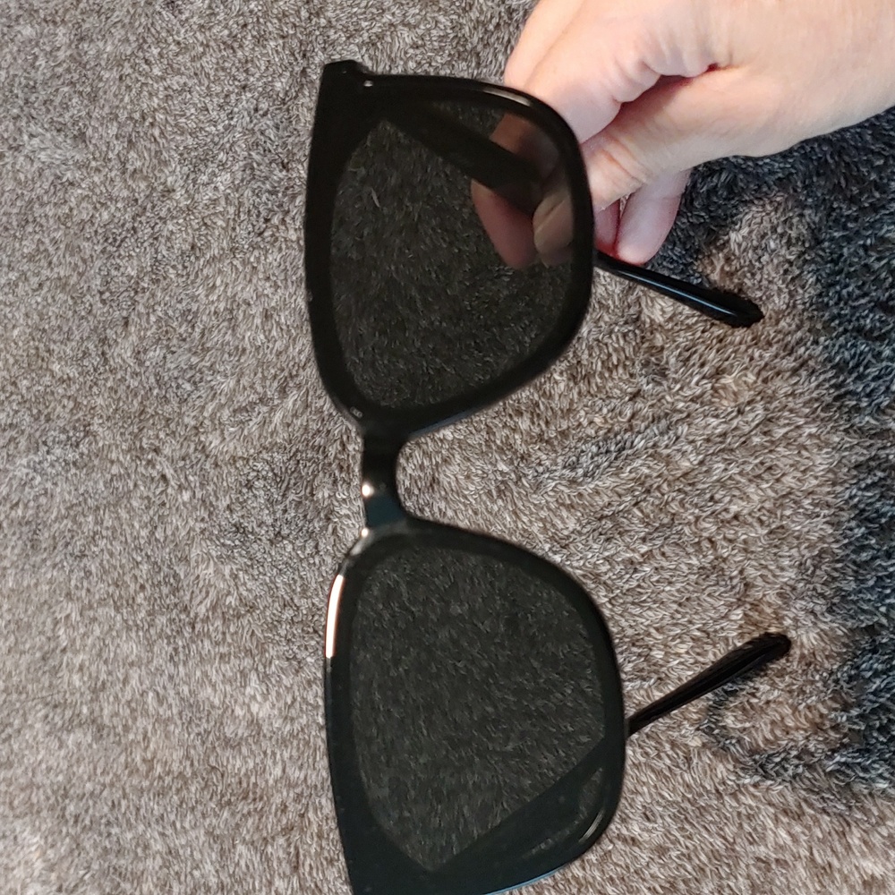 Women sunglasses a little bit scared on the lines please see on photo